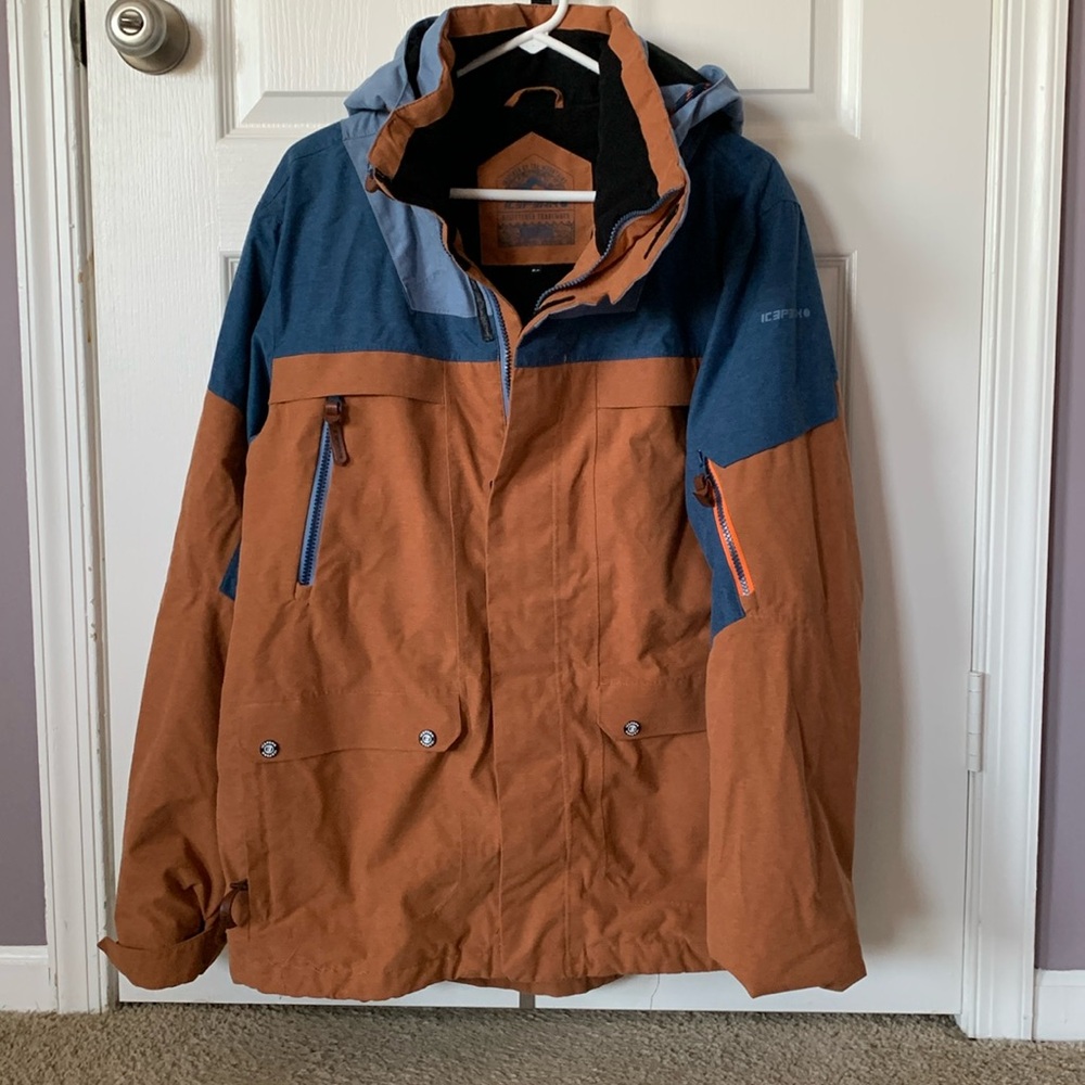 Like new Ice Peak ski/snowboard jacket with fasteners to attach to ski pants